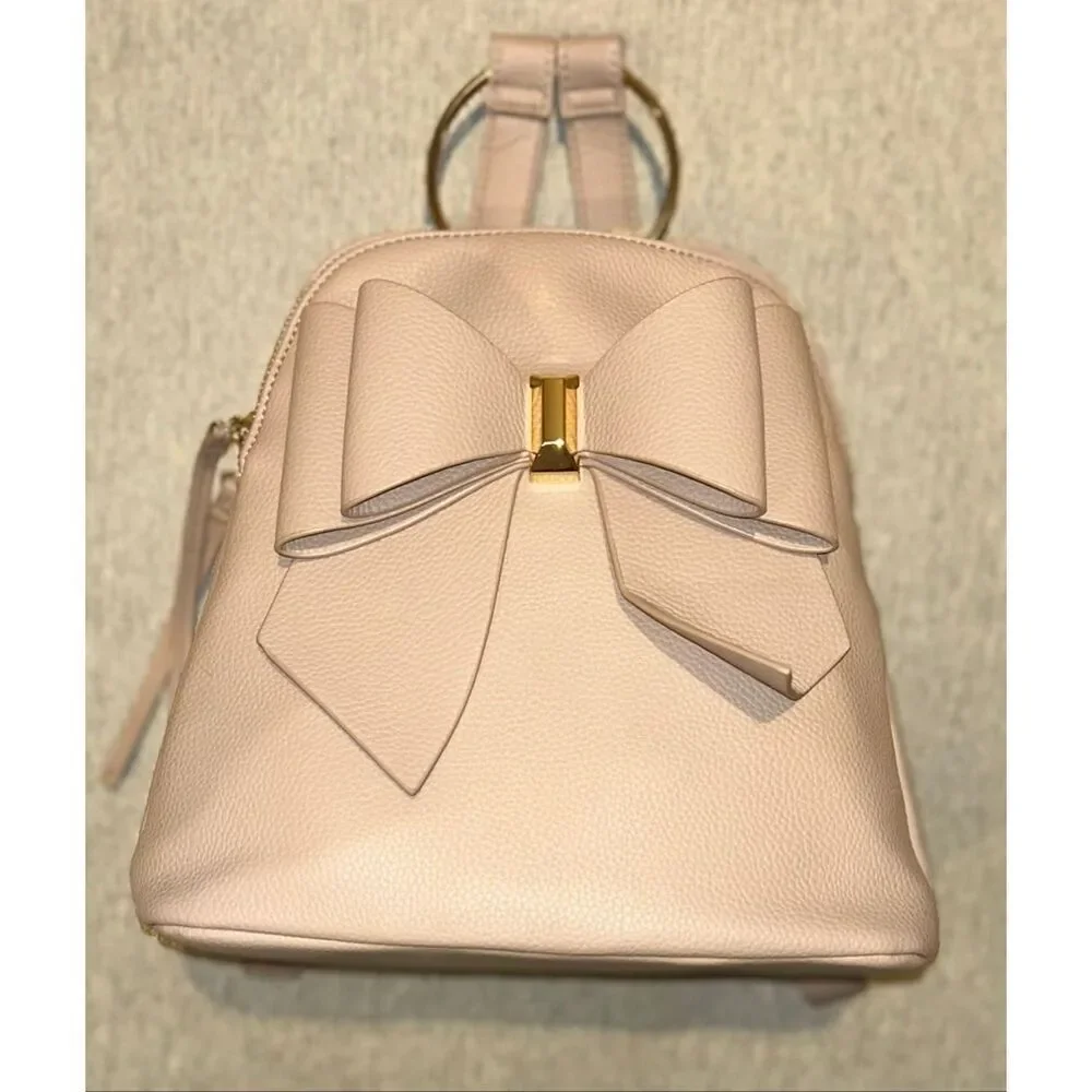 Tan bow backpack